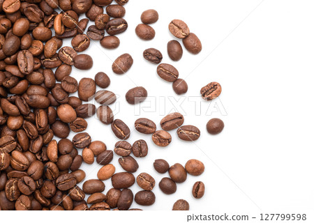 Roasted coffee beans on white, top view 127799598