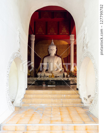 Tranquil White Buddha in Sacred Temple. Tranquil White Buddha in Sacred Temple. 127799782