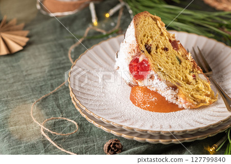 Slices of Bolo Rei or Kings Cake.  Is a traditional Xmas cake made for Christmas, Carnavale or Mardi Gras 127799840