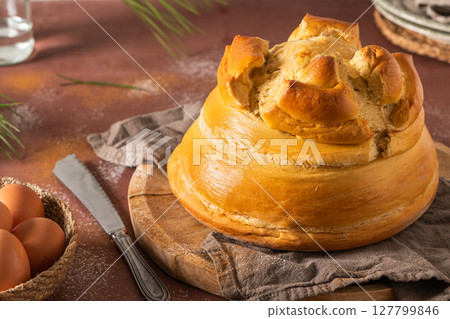 Fogaca on kitchen countertop. Fogaca is a traditional cake from Santa Maria da Feira, Aveiro, Portugal 127799846