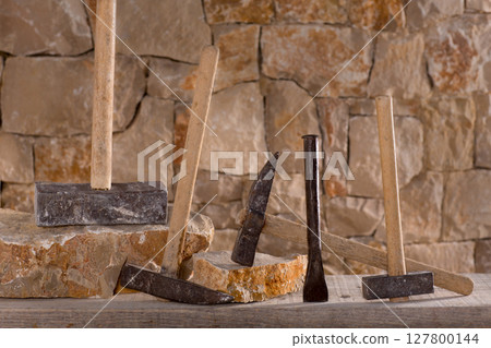 Hammer tools of stonecutter masonry work 127800144