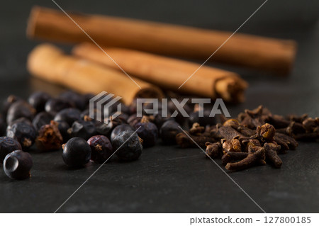 cloves cinnamon juniper berries Gyn tonic spices 127800185