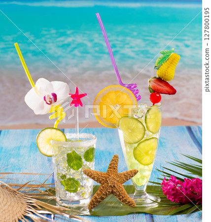 Mojito and lemon lime Cocktails in tropical blue wood 127800195