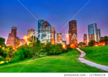 Houston Texas modern skyline at sunset twilight on park Houston Texas modern skyline at sunset twilight on park 127800229