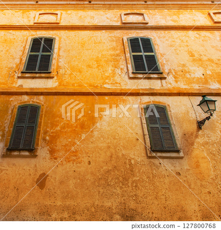 Ciutadella Menorca wooden shutter window 127800768