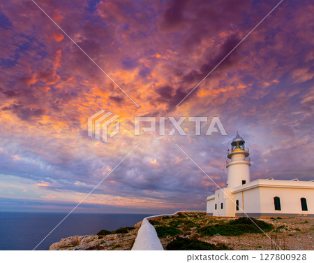 Menorca sunset at Faro de Caballeria Lighthouse 127800928