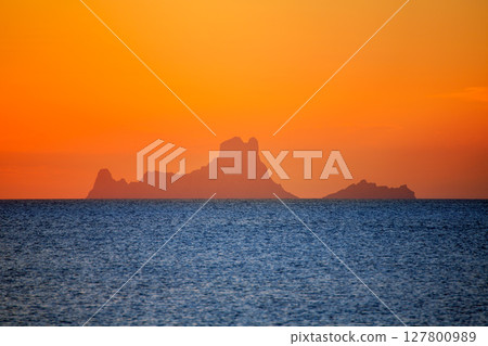 Ibiza sunset Es Vedra view from Formentera Ibiza sunset Es Vedra view from Formentera 127800989