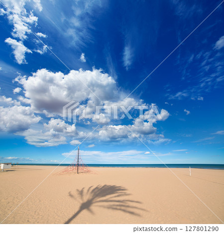 Gandia Beach sand in Mediterranean Sea of Spain 127801290