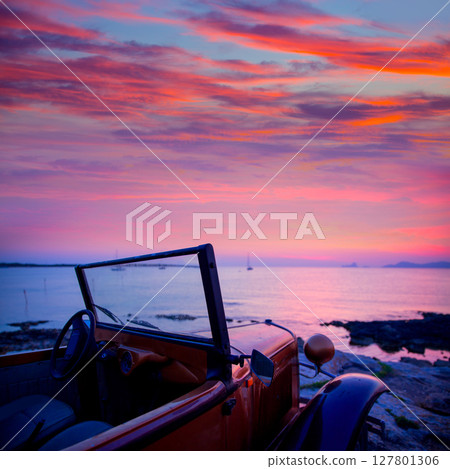 Ibiza sunset view from vintage car at Formentera Ibiza sunset view from vintage car at Formentera 127801306