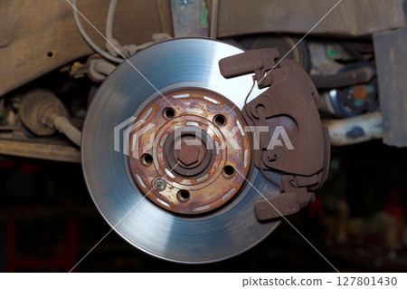 Car wheel brake rusty disc with pads rotor disc and caliper Car wheel brake rusty disc with pads rotor disc and caliper 127801430