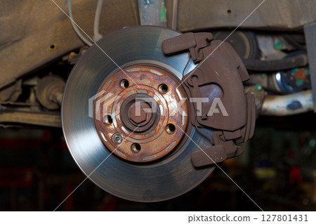 Car wheel brake rusty disc with pads rotor disc and caliper Car wheel brake rusty disc with pads rotor disc and caliper 127801431