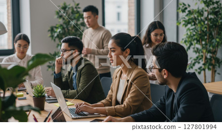 Asian Man in White T-Shirt Showing Gratitude with Praying Hands - Peaceful and Respectful Expression for Mindfulness or Wellness Concept 127801994
