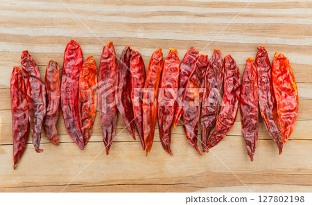 Chile de arbol seco dried hot Arbol pepper 127802198