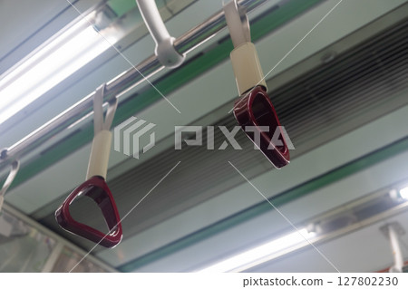Interior view of the subway with hand grip, in Seoul, South Korea 127802230