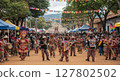 Colorful Cultural Parade with Traditional Costumes at a Latin American Festival 127802502