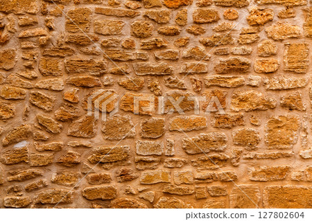 Alcudia Old Town masonry wall texture Mallorca Alcudia Old Town masonry wall texture Mallorca 127802604