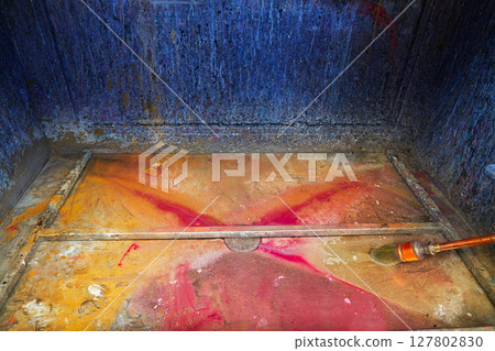 Cleaning thinner brush in a print factory colorful 127802830