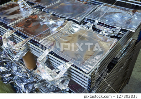bags factory in silver fabric stacked 127802833