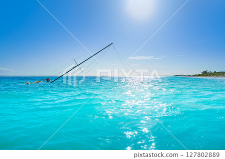 Caribbean sailboat shipwreck after storm 127802889