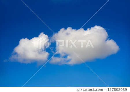 Blue sky summer white cumulus clouds Blue sky summer white cumulus clouds 127802989