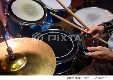 Dynamic and Engaging Drumming Session Featuring a Complete Drum Set and Beautiful Cymbals Dynamic and Engaging Drumming Session Featuring a Complete Drum Set and Beautiful Cymbals 127803580