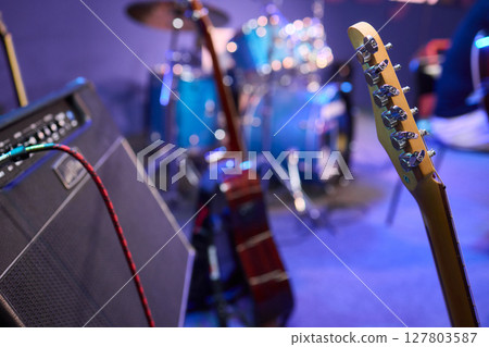 Exploring Musical Instruments in a Professional Studio Setting with Creativity and Passion Exploring Musical Instruments in a Professional Studio Setting with Creativity and Passion 127803587