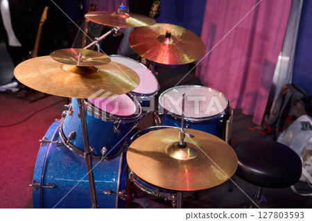 Dynamic and Engaging Drumming Session Featuring a Complete Drum Set and Beautiful Cymbals Dynamic and Engaging Drumming Session Featuring a Complete Drum Set and Beautiful Cymbals 127803593