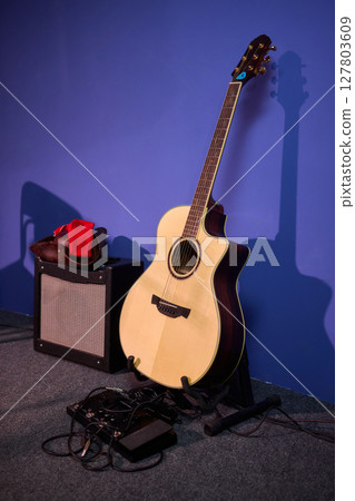 Exploring Musical Instruments in a Professional Studio Setting with Creativity and Passion Exploring Musical Instruments in a Professional Studio Setting with Creativity and Passion 127803609