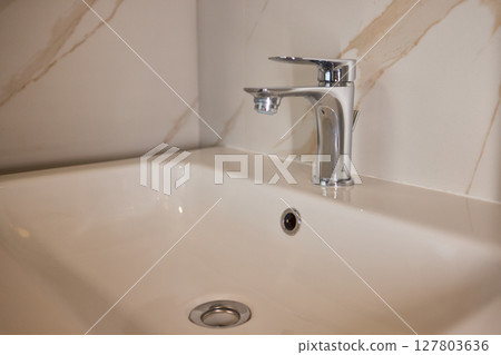 Explore trends in Modern Bathroom Faucet and Tub Design, focusing on elegance and style Explore trends in Modern Bathroom Faucet and Tub Design, focusing on elegance and style 127803636