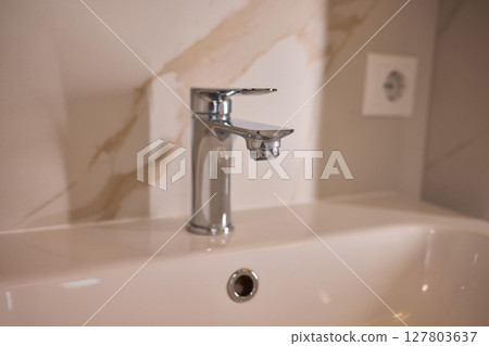 Explore trends in Modern Bathroom Faucet and Tub Design, focusing on elegance and style Explore trends in Modern Bathroom Faucet and Tub Design, focusing on elegance and style 127803637