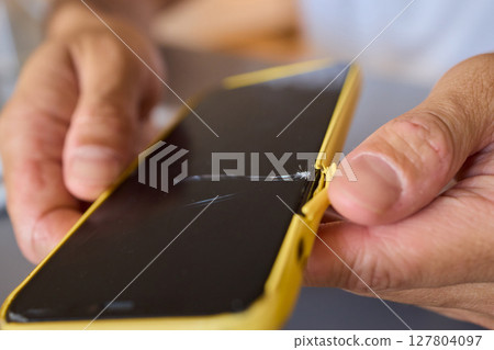 The detailed process for repairing a damaged smartphone screen includes various steps and tools The detailed process for repairing a damaged smartphone screen includes various steps and tools 127804097