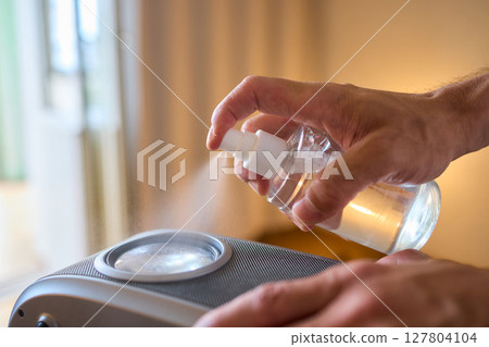 It is important to clean a projector lens carefully using a microfiber cloth for best results 127804104
