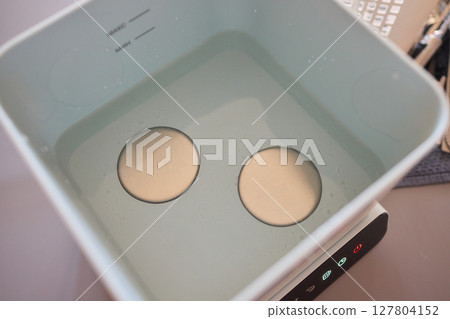 Kitchen Tools and Equipment Arranged Neatly in a Basket for Easy Access and Organization 127804152