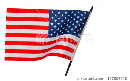 National flag of United States with black plastic post tilted forward and with curved canvas wriggling in wind is isolated on transparent background. Blank for holidays art works with clipped path 127804628