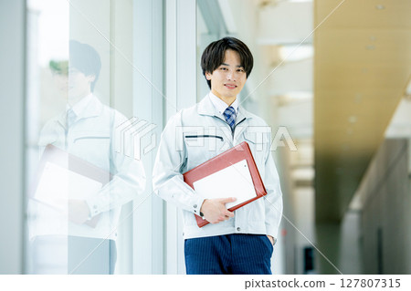 Young engineer in the office 127807315