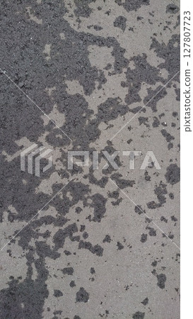Wet asphalt 127807723
