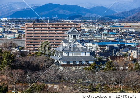 Nagahama Castle tower seen with the mountains in the background Nagahama Castle tower seen with the mountains in the background 127808175