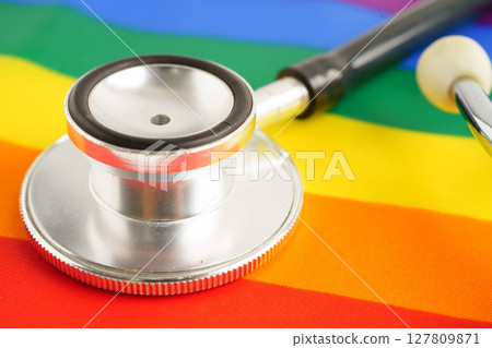 Stethoscope on LGBT rainbow flag, rights and gender equality. Stethoscope on LGBT rainbow flag, rights and gender equality. 127809871