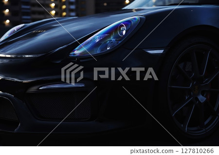 sleek black sports car 127810266