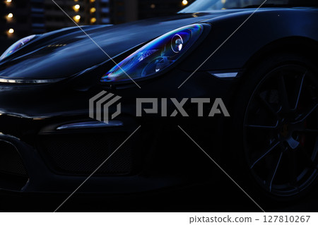 sleek black sports car 127810267