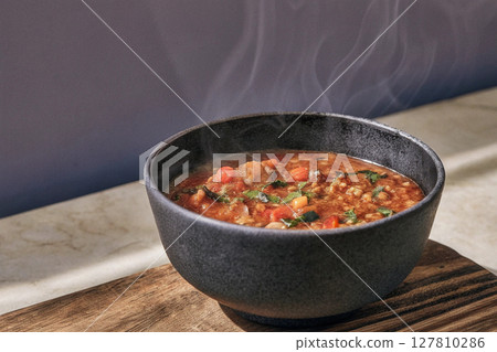 a flavorful bowl of saltah stew 127810286