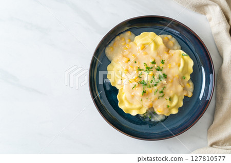 ravioli pasta with corn cheese sauce ravioli pasta with corn cheese sauce 127810577