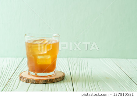 Delicious sweet drink tamarind juice and ice cube 127810581