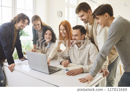 Young people discussing job project or new startup with brainstorming on workplace in office. Young people discussing job project or new startup with brainstorming on workplace in office. 127811689