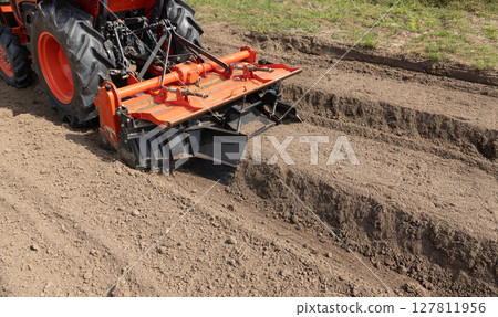 Farm tractor equipment for making raised garden bed rows. 127811956