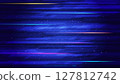Abstract glowing light speed lines and glitter light effect on dark blue background 127812742