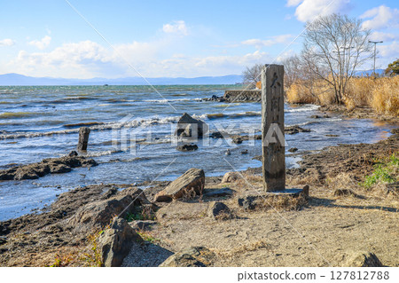 The stone pillars of the former Taiko Well standing on the shore of Lake Biwa The stone pillars of the former Taiko Well standing on the shore of Lake Biwa 127812788