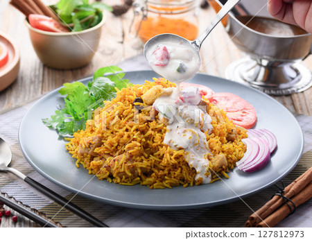 Indian food Chicken Biryani and Raita (Indian style yogurt salad) Indian food Chicken Biryani and Raita (Indian style yogurt salad) 127812973