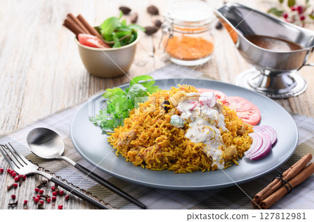 Indian food Chicken Biryani and Raita (Indian style yogurt salad) Indian food Chicken Biryani and Raita (Indian style yogurt salad) 127812981