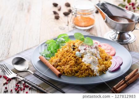 Indian food Chicken Biryani and Raita (Indian style yogurt salad) 127812983